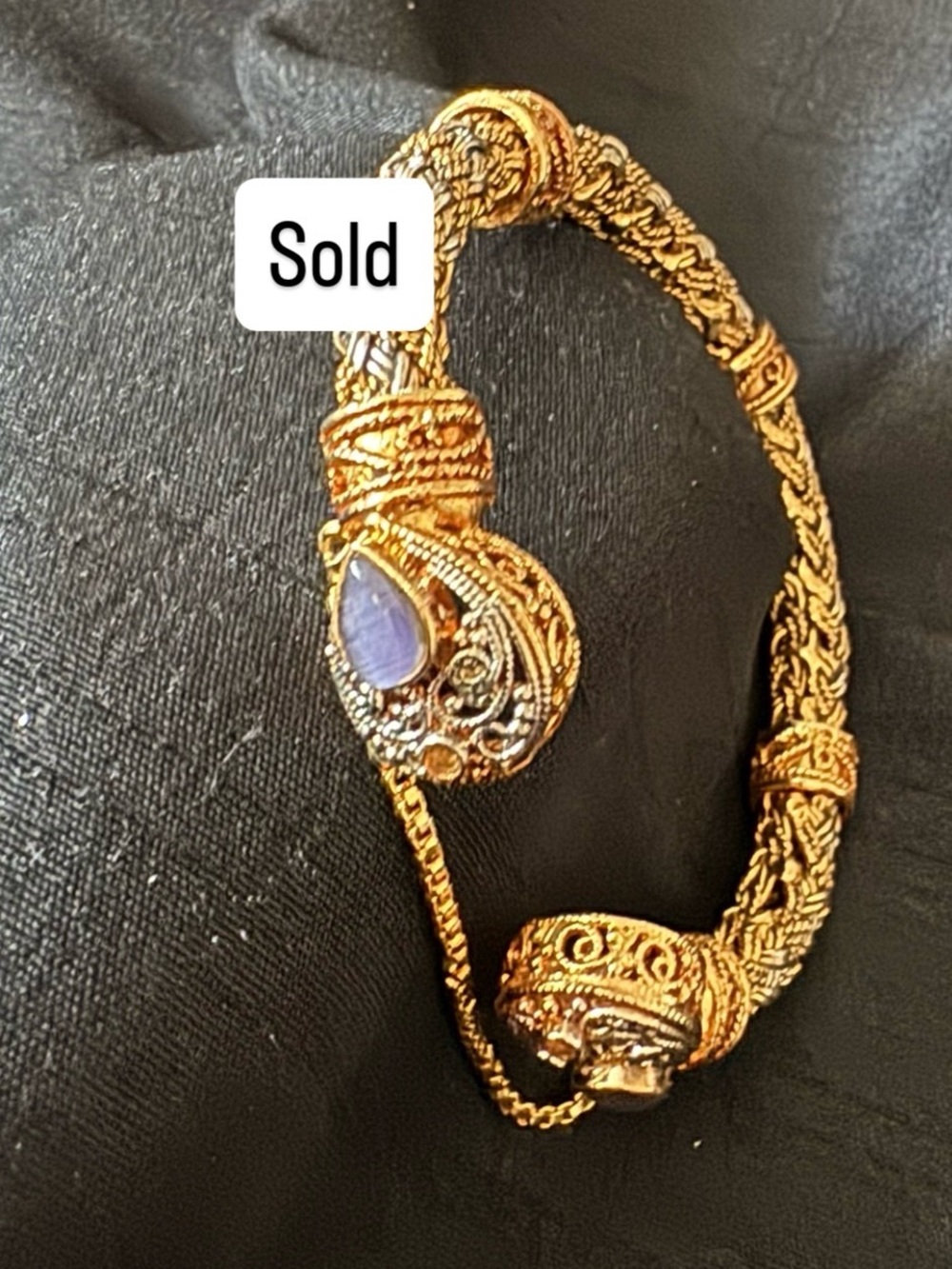 Gold-Tone Filigree Cuff Bracelet with Purple Stone